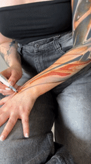 Person with colorful full sleeve tattoo spotted in Moscow