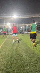 Nighttime soccer match documented at Abuja sports complex