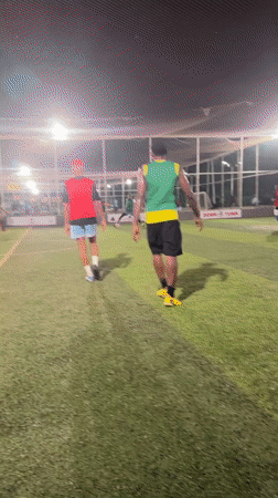 Nighttime soccer match documented at Abuja sports complex
