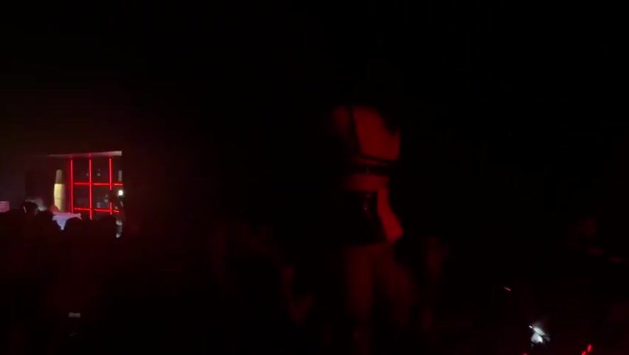 Performer dances on stage at Milan nightclub