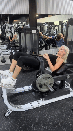 Woman exercises at gym in Choeng Mon, Thailand