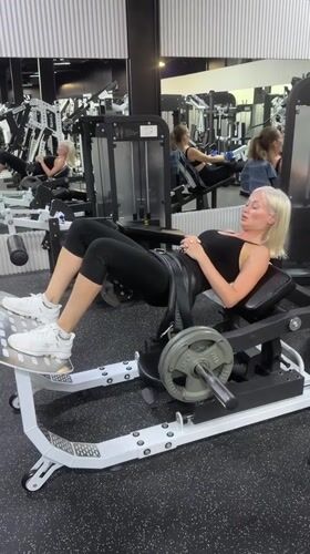 Woman exercises at gym in Choeng Mon, Thailand