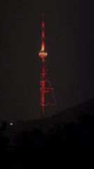 Tbilisi TV Tower documented in multiple perspectives over evening hours