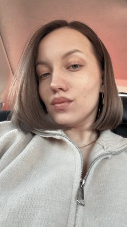 Woman travels by car across bridge in Bezborodovo