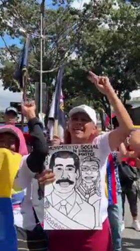 Pro-government rally draws hundreds to Caracas streets with Venezuelan flags