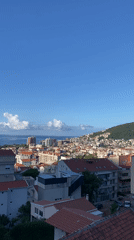 Aerial view captures Budva's red rooftops and Adriatic coastline