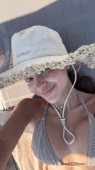 Poolside selfie in Bodrum wearing a Jacquemus hat
