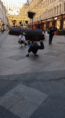 Street performers entertain crowds near Red Square in Moscow