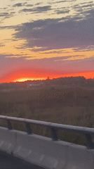 Vivid sunset captured from highway near Bétera, Spain