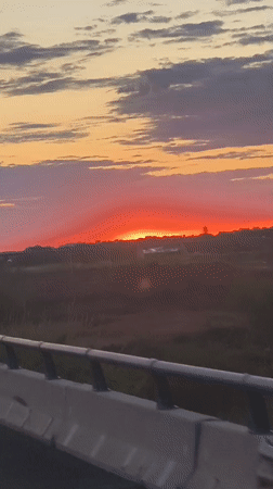 Vivid sunset captured from highway near Bétera, Spain