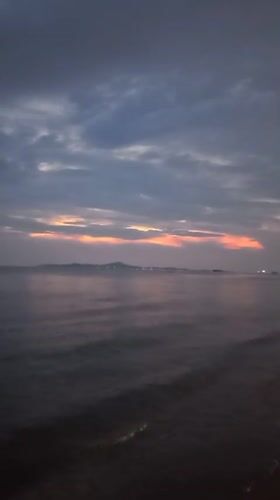 Sunset observed over ocean waters in Pattaya City, Thailand