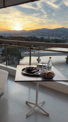 Balcony dining scene captured in French Riviera town