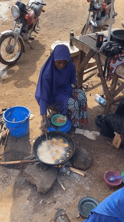 Morning street food operations documented in Nigerian neighborhoods