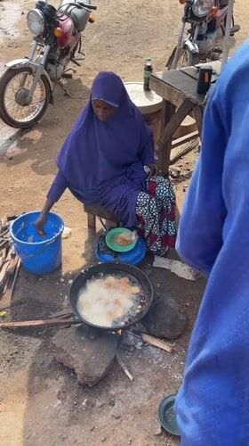 Morning street food operations documented in Nigerian neighborhoods