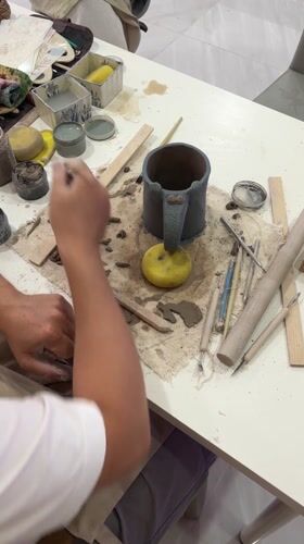 Artist documents pottery workshop session in Ko Kaeo, Thailand