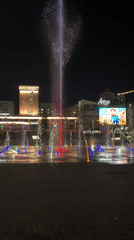 Evening fountain display and street performance draws crowds in Perm