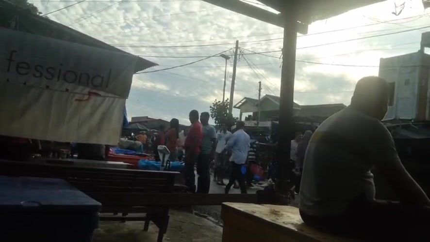 Active fish market documented throughout evening in Lhokseumawe Indonesia