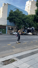 Longboarder spotted cruising Buenos Aires street Monday evening