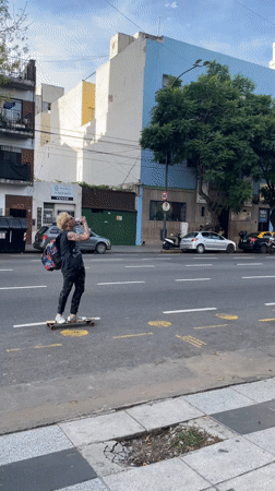 Longboarder spotted cruising Buenos Aires street Monday evening