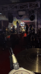 Nighttime entertainment event with live music and social gathering documented