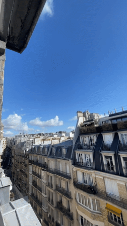 Editing surf footage on a laptop in Paris