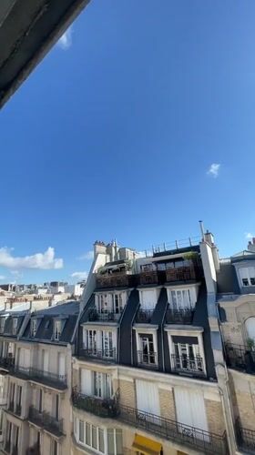 Editing surf footage on a laptop in Paris