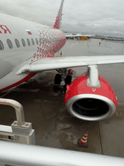Aircraft operations observed at airport tarmac under overcast conditions