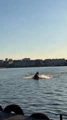 Graduation celebrations along Ternopil Pond at sunset