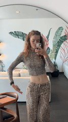 Woman Takes Multiple Mirror Selfies in Budva, Montenegro