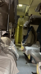 Train sleeping car interiors documented during evening journey