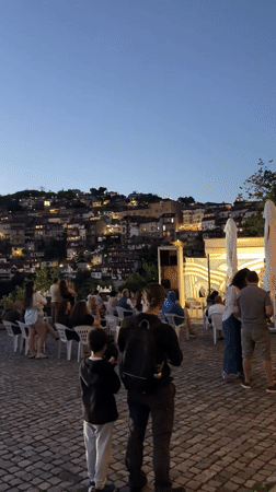 Evening scenes across historic Veliko Tarnovo with monuments and music