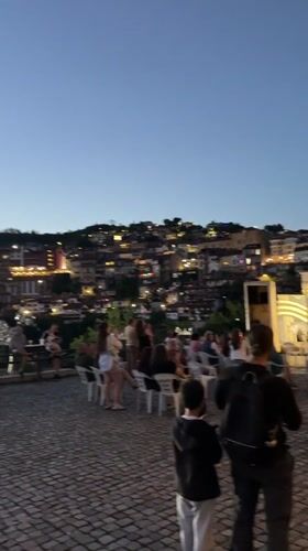 Evening scenes across historic Veliko Tarnovo with monuments and music