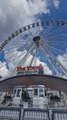 Brussels city center: Ferris wheel, Palace of Justice, summer afternoon