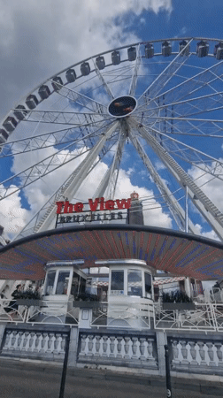 Brussels city center: Ferris wheel, Palace of Justice, summer afternoon