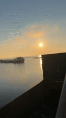 Ship captures sunrise over calm waters near Burgas