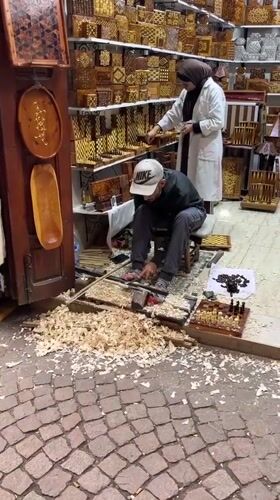 Woodworking shop activity captured in Marrakesh souk