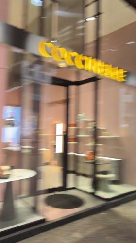 Morning activity captured at Milan luxury shopping arcade