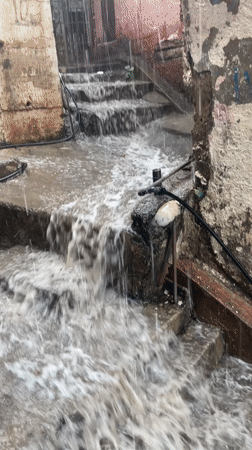 Heavy rainfall floods concrete steps in Caracas, Venezuela