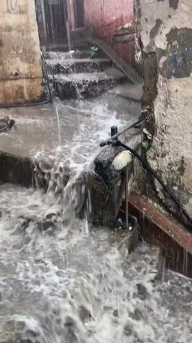 Heavy rainfall floods concrete steps in Caracas, Venezuela