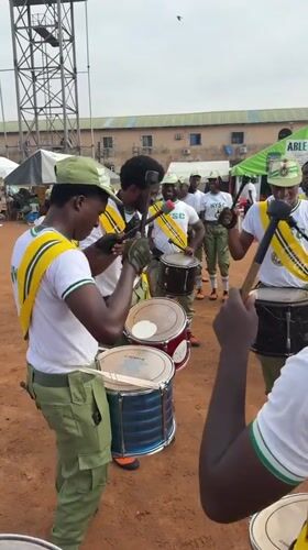 NYSC marching band drills outdoors in Alagba, Nigeria