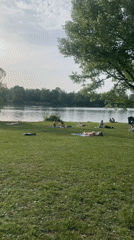 Munich lakeside park draws afternoon crowds on sunny day
