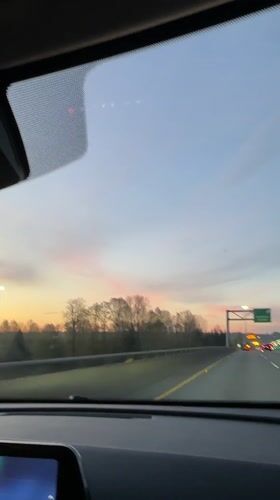 Driver records highway sunset view in Delta, Canada