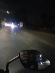 Motorcyclist captures nighttime street journey in Lhokseumawe, Indonesia