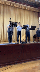 Community cultural performance features trumpeters and ballet dancers in Ukraine