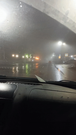 Night driving through foggy wet streets in Sarapul, Russia