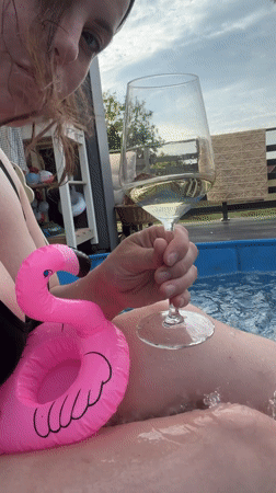 Backyard pool day in Germany with wine and a Corgi