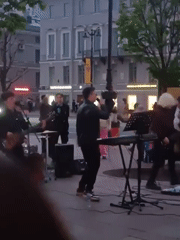 Street performances, dancing, altercation observed in Saint Petersburg twilight