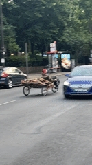 Street party with makeshift tricycle entertains London crowd