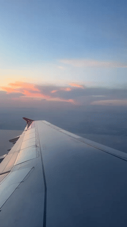 Passenger captures sunset wing view over Antalya Turkey