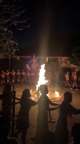 Scout group holds nighttime bonfire ceremony in Sukawati, Indonesia